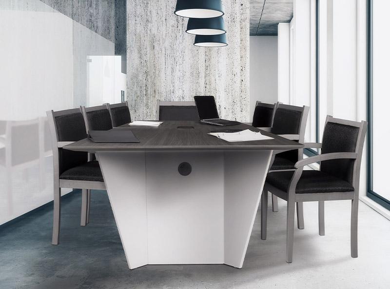 7 Side chairs with black fabric chairs around a modern conference table with a grey top and white base