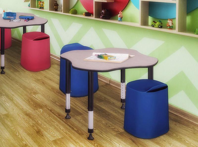 4 Classroom chairs around school tables